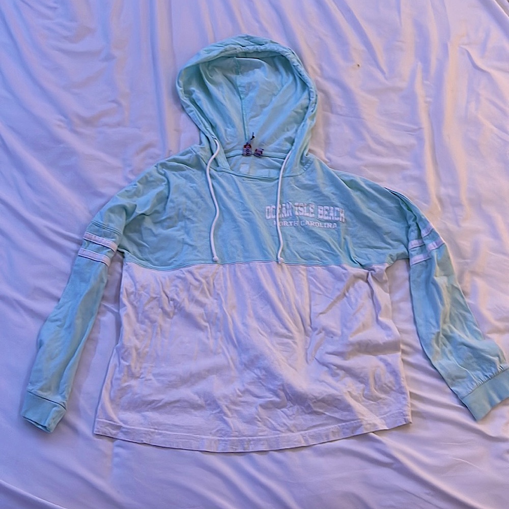 Lightweight sweatshirt with Ocean Isle Beach logo.
